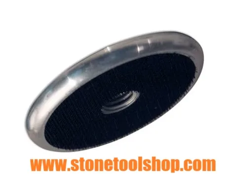 Aluminum back pad for polishing ogee edges on marble, granite, and quartz surfaces.