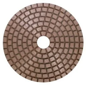 Copper diamond polishing pad for marble and granite stone surfaces.