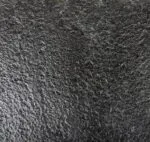 Antique brushed granite with a leathered finish in a diamond pattern.