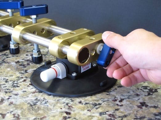 Seam setter tool for granite Omini Cubed Gorilla backsplash installation.