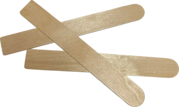 Colorful stir sticks and adhesives for arts and crafts projects.