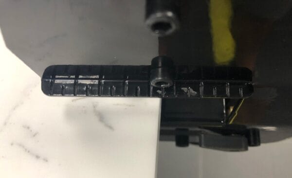 Machine notches on industrial equipment showcasing precision engineering and design.