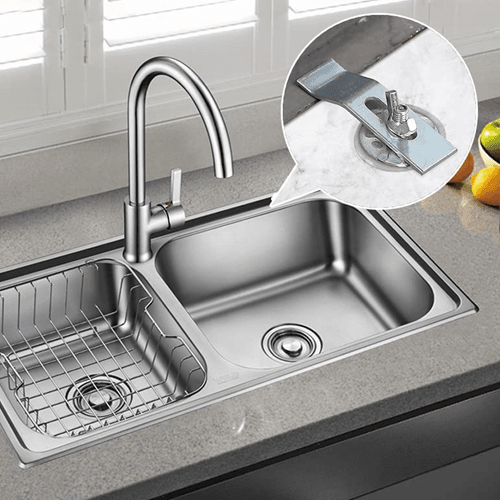 Undermount sink clips securing a sleek sink on a kitchen countertop.